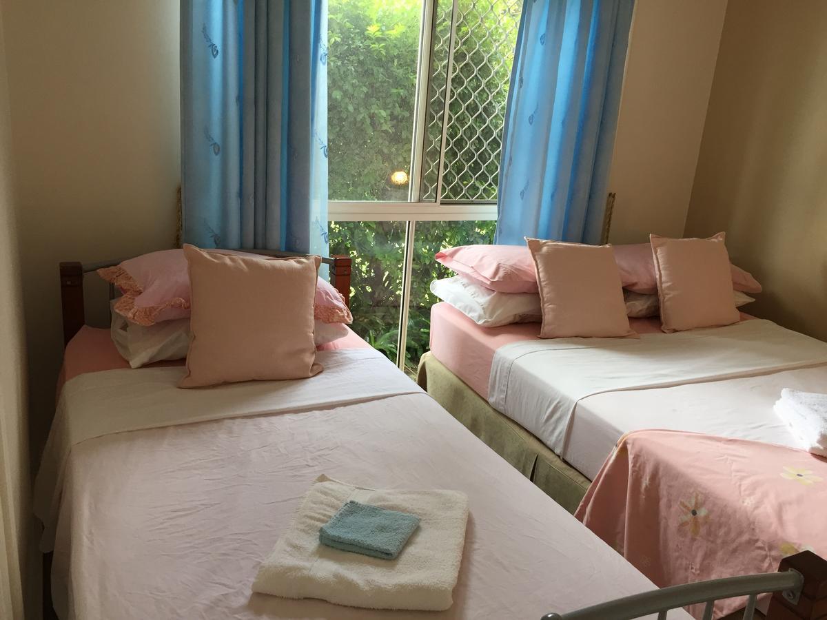 Theme Parks Amituofo Homestay Gold Coast Buitenkant foto